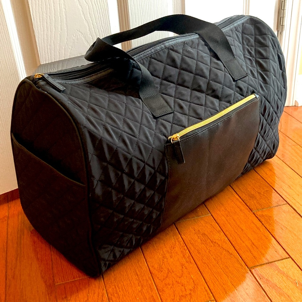 NWOT Black Quilted weekender bag.